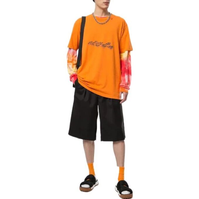 Geometri-pil-logo-trykk Rund hals Shorts Kort erme Oransje