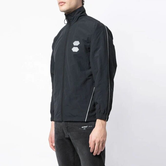 Jakke i ensfarget stoff med stående krage og glidelås, slim fit-versjon, svart