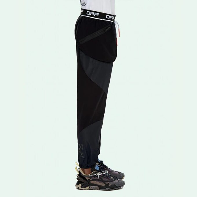 Lang sportsbuks med logo-pil-trykk og snøring, slim fit-versjon, svart