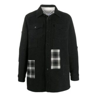 Oversized skjorte med rutete lommer og knapper