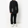 Oversized skjorte med rutete lommer og knapper