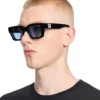 Virgil M solbriller med lyseblå glass